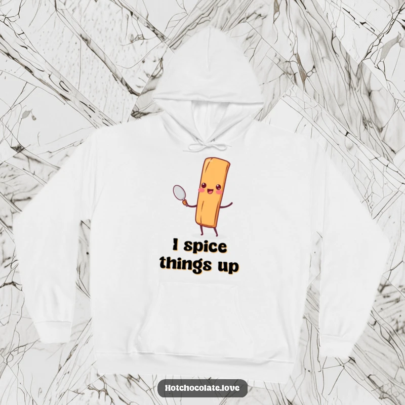 Funny Cinnamon Stick Spoon Hoodie: A cheerful cinnamon stick character is depicted holding a tiny spoon, radiating warmth and humor.