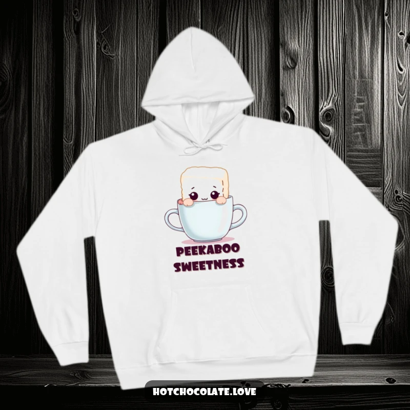 Funny hoodie featuring a curious sugar cube character peeking over a mug rim, offering warmth and a playful, humorous design.