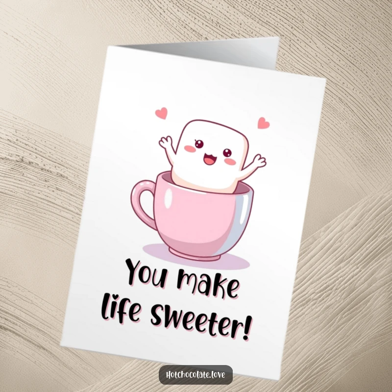 Funny Free Printable Birthday Card: A joyful marshmallow waves happily from inside a warm mug, spreading birthday cheer.